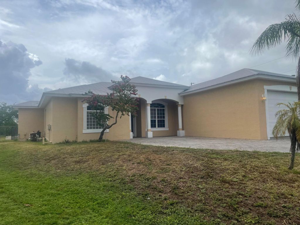 Photo of 2643 SW Harem Circle, Port Saint Lucie, FL 34953 (MLS # R11169788)