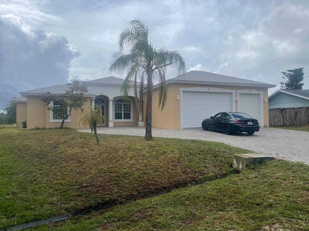 Photo of 2643 SW Harem Circle, Port Saint Lucie, FL 34953 (MLS # R11169788)