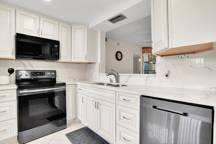 This property is ideally located on the 18th hole of the golf course, offering a desirable north-facing exposure. BRAND NEW A/C & WATER HEATER. You can choose between furnished and unfurnished layouts to suit your style. The home features five ceiling fans and has all-tile flooring throughout. The beautifully remodeled kitchen, completed in 2019, provides an excellent space for entertaining friends and family. The elegant diagonal tile flooring enhances the overall appeal of the home. You can relax and unwind on the enclosed patio overlooking the lake and golf course. It is equipped with metal shutters and Plexiglass for year-round comfort. Check out all the photos and come see it for yourself!