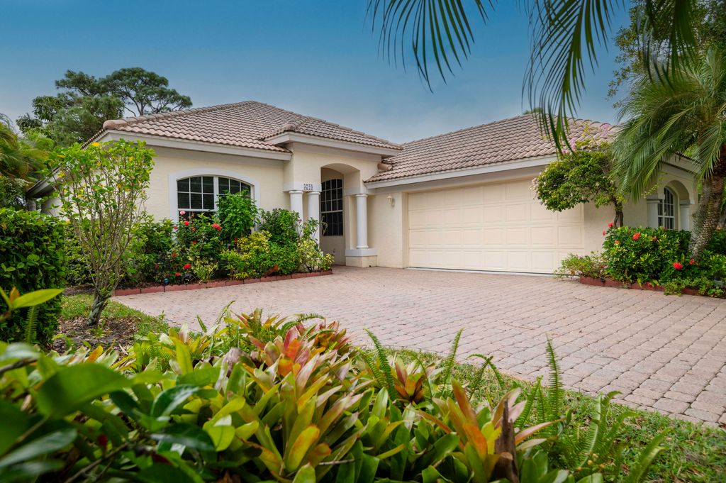 Photo of 3720 NW Royal Oak Drive, Jensen Beach, FL 34957 (MLS # R10937095)