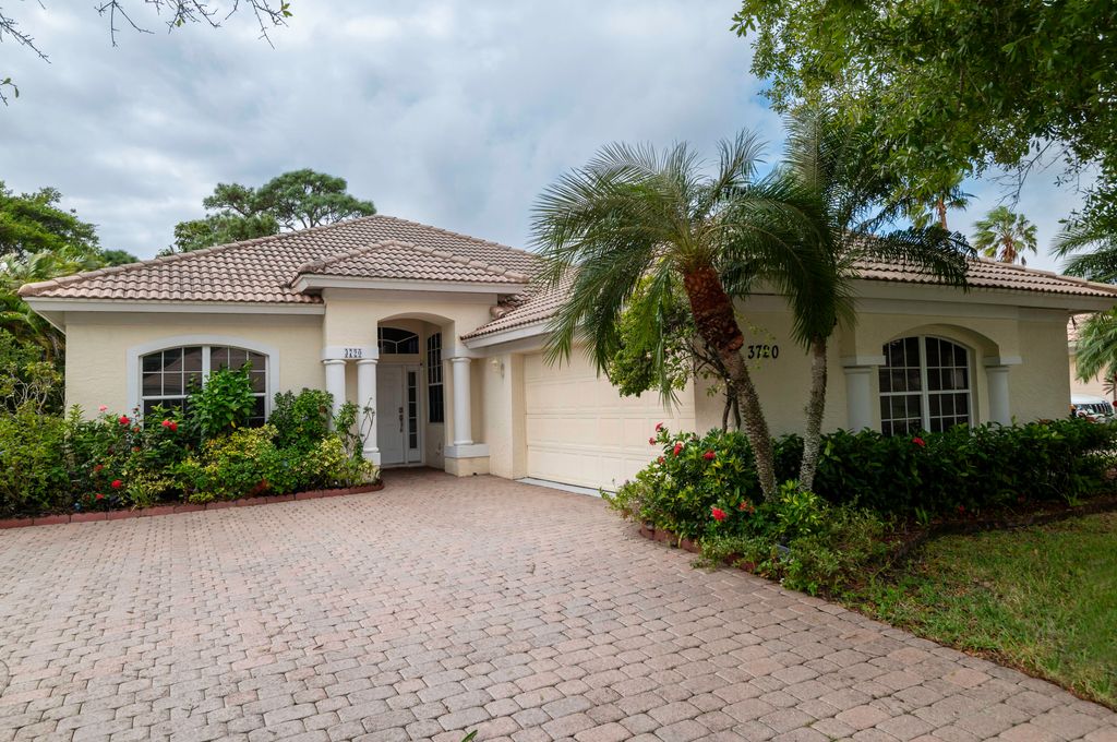 Photo of 3720 NW Royal Oak Drive, Jensen Beach, FL 34957 (MLS # R10937095)