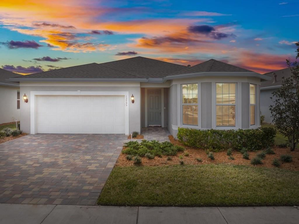 Highly motivated seller! Palmary floor plan with the FM2 elevation. Upgrades everywhere. Enjoy a private view from your screened in lanai, designer white cabinets, and lagoon quartz countertops with full height tile backsplash. Beach/White Surf tile flooring throughout. 8' Doors, and Sherwin Williams 'Repose Gray' paint. Del Webb Tradition is a vibrant 55+ community that enhances your active lifestyle with resort-style amenities. HOA includes: pool, fitness center, clubhouse, pickleball, tennis, bocce ball courts, dog park, cable, internet, phone service, gated access, and lawn care.