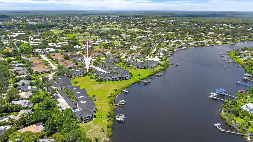 MOTIVATED SELLER! Step into this beautifully reimagined WATERFRONT 2,368 sq. ft. condo that offers the space and feel of a single-family home. Perfectly positioned in the exclusive Turtle Creek Golf & Country Club, this rare east-facing residence boasts sweeping, unobstructed views of the river—an everyday backdrop that's nothing short of breathtaking. Designed for both elegance and functionality, the open-concept layout is flooded with natural light, showcasing 3 spacious bedrooms & 3 designer bathrooms. No detail has been overlooked, from the custom, high-end cabinetry and sleek quartz countertops to the state-of-the-art appliances, new flooring, and energy-efficient LED lighting throughout. The expansive primary suite is a true sanctuary, featuring his-and-her walk-in closets and a spa-inspired bathroom designed for ultimate relaxation. Storage is never an issue, with oversized closets throughout the home. Convenience is key: enjoy deeded covered parking just steps from your door, dedicated golf cart parking, and generous guest parking. Boating enthusiasts will appreciate the available 13,000 lb boat lift for lease, offering direct access to the river and beyond. There is also a slip available for purchase! ALSO BONUS: LOWER MARTIN COUNTY PROPERTY TAXES! Residents also have the option to join the prestigious Turtle Creek Golf & Country Club, enjoying access to premier golf and social amenities that elevate the Florida lifestyle. Best of all, this luxurious retreat comes the best location in Jupiter making it an exceptional place to call home. Don't miss this rare opportunity to experience the ultimate blend of luxury, leisure, and waterfront living.