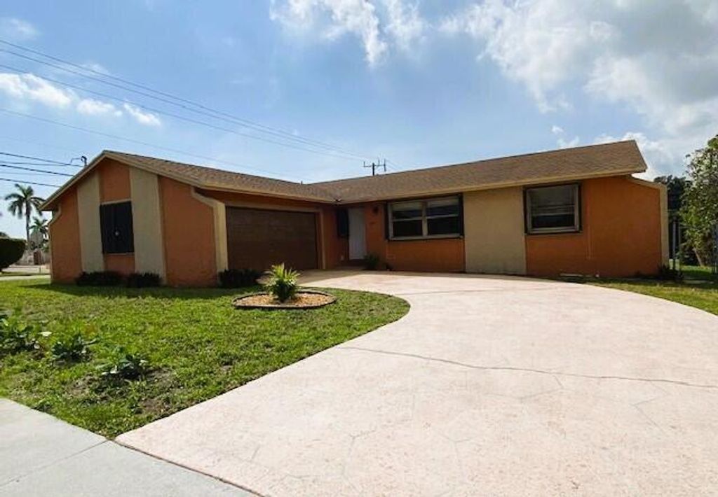 Photo of 1301 W 30th Street, Riviera Beach, FL 33404 (MLS # R10966993)