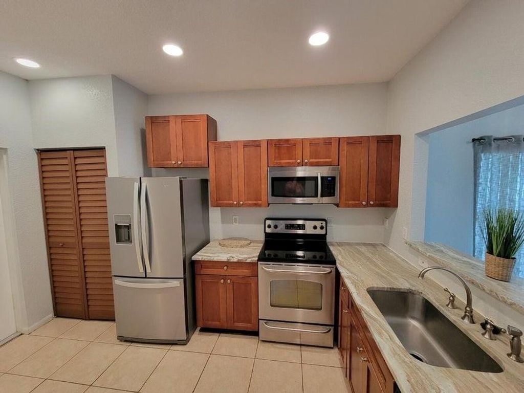 Photo of 197 NW Eller St, Deerfield Beach, FL 33441 (MLS # F10540526)