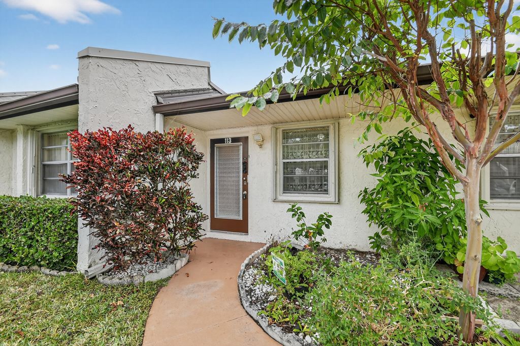 Photo of 113 Lake Olive Drive #113, West Palm Beach, FL 33411 (MLS # R11161903)