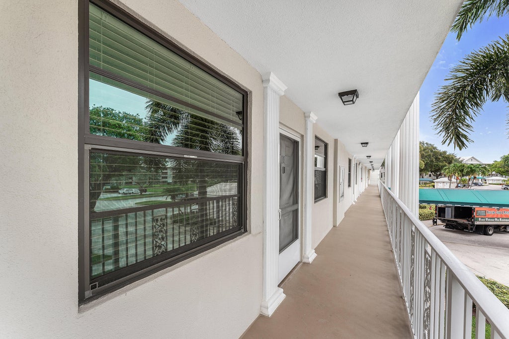 Photo of 6097 Balboa Circle #202, Boca Raton, FL 33433 (MLS # B26046205)