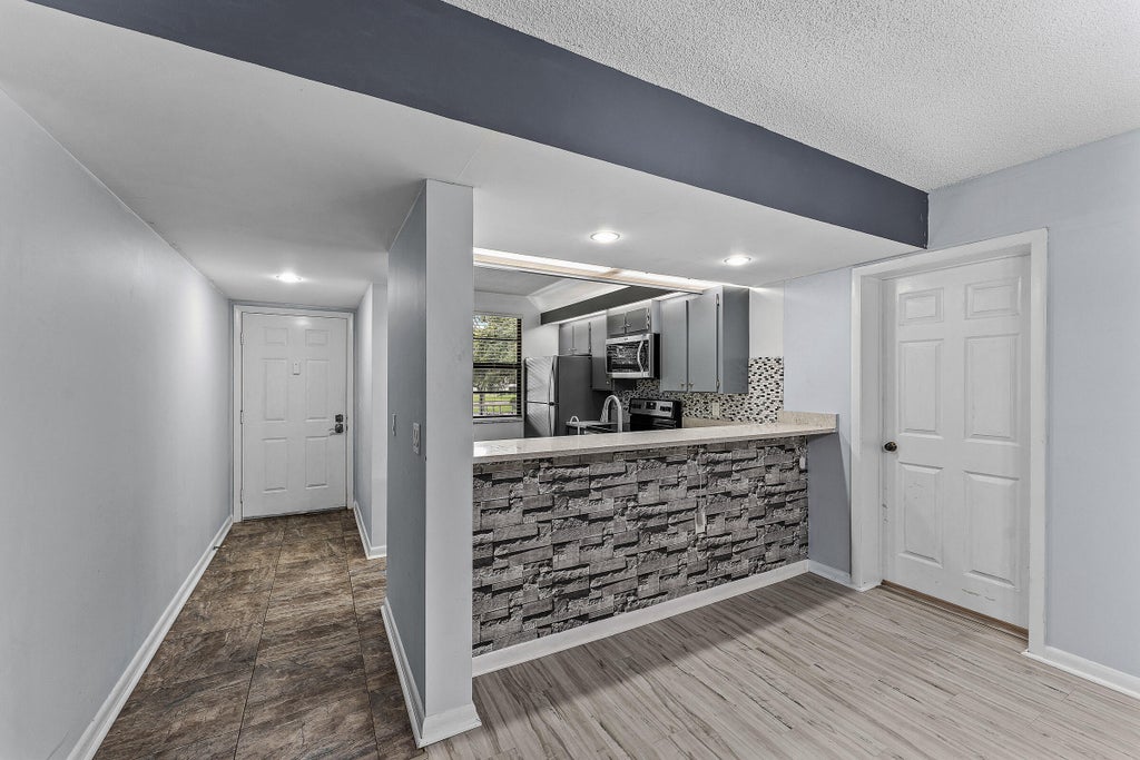 Photo of 6097 Balboa Circle #202, Boca Raton, FL 33433 (MLS # B26046205)