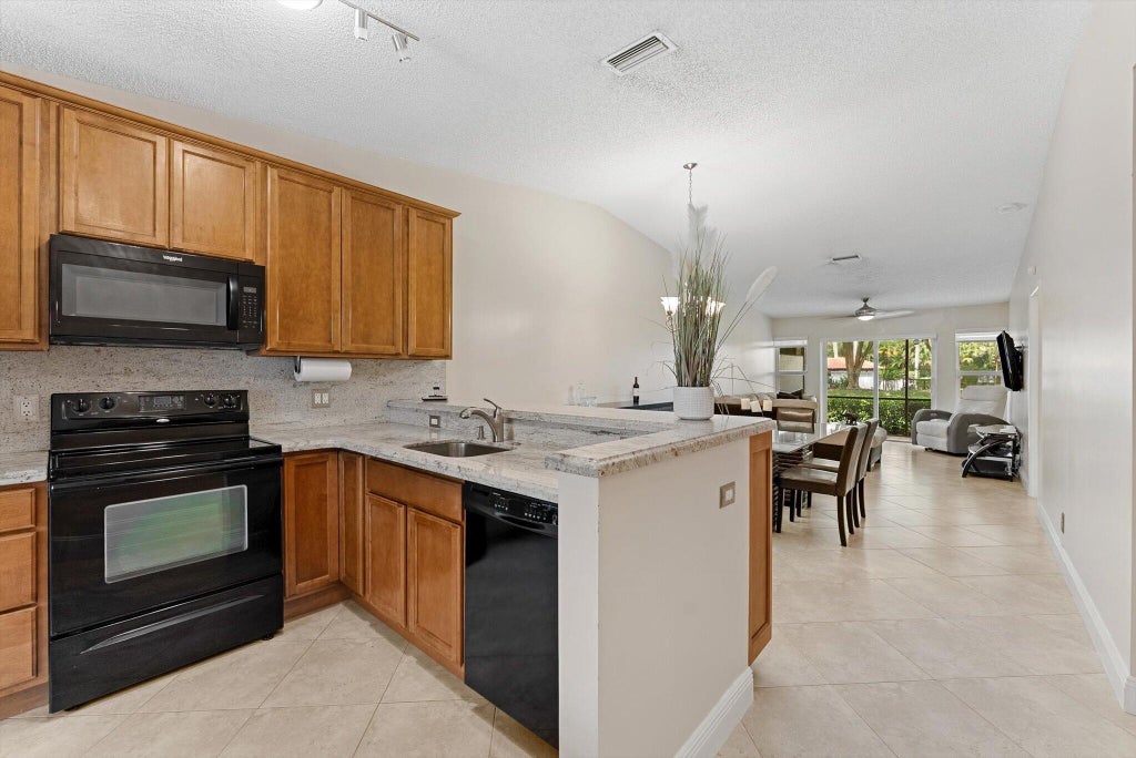 Photo of 8959 Sunnywood Place, Boca Raton, FL 33496 (MLS # B26086015)