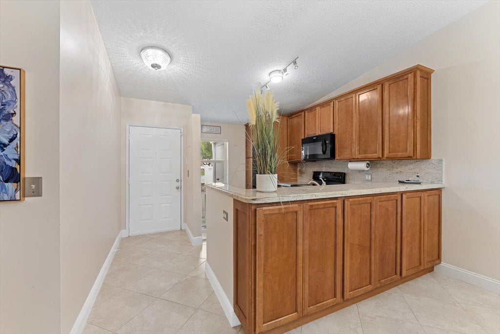 Photo of 8959 Sunnywood Place, Boca Raton, FL 33496 (MLS # B26086015)