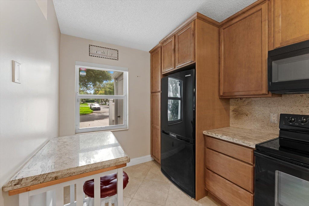 Photo of 8959 Sunnywood Place, Boca Raton, FL 33496 (MLS # B26086015)