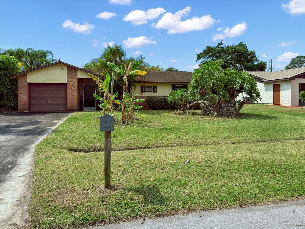 Photo of 118 SW Lancaster Avenue, Port Saint Lucie, FL 34984 (MLS # F10498967)