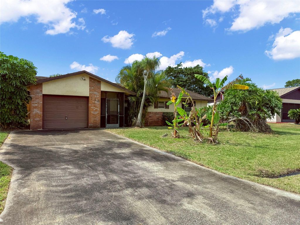 Photo of 118 SW Lancaster Avenue, Port Saint Lucie, FL 34984 (MLS # F10498967)