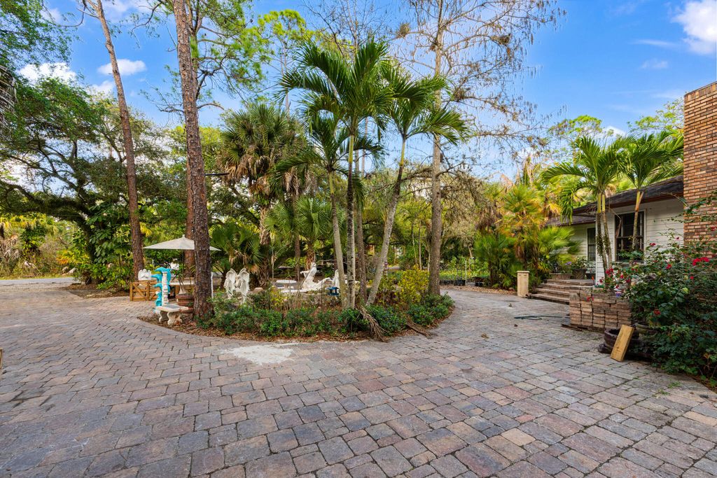 Photo of 16446 E Aintree Drive, The Acreage, FL 33470 (MLS # R11168017)