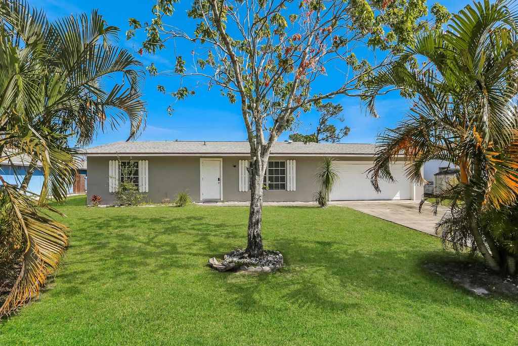 Photo of 393 SE Galleon Lane, Port St Lucie, FL 34983 (MLS # R10972432)