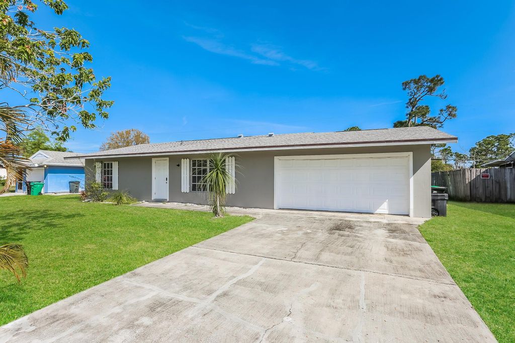 Photo of 393 SE Galleon Lane, Port Saint Lucie, FL 34983 (MLS # R10972432)