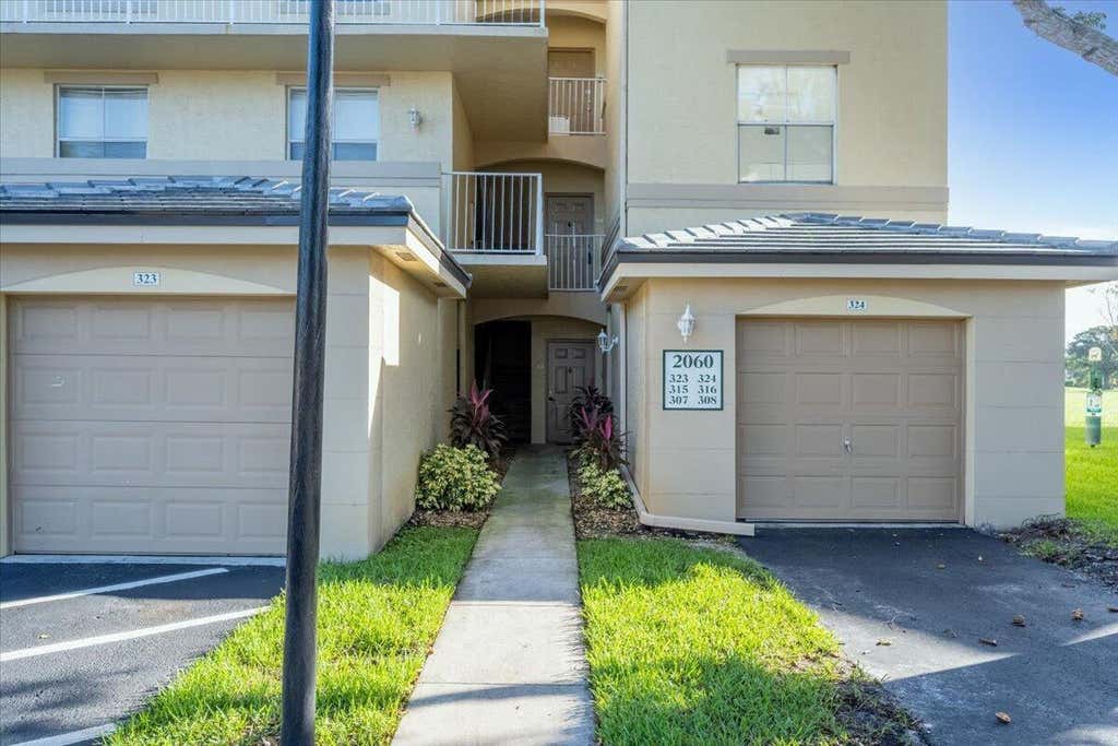 Photo of 2060 Greenview Shores Boulevard #308, Wellington, FL 33414 (MLS # B26043823)