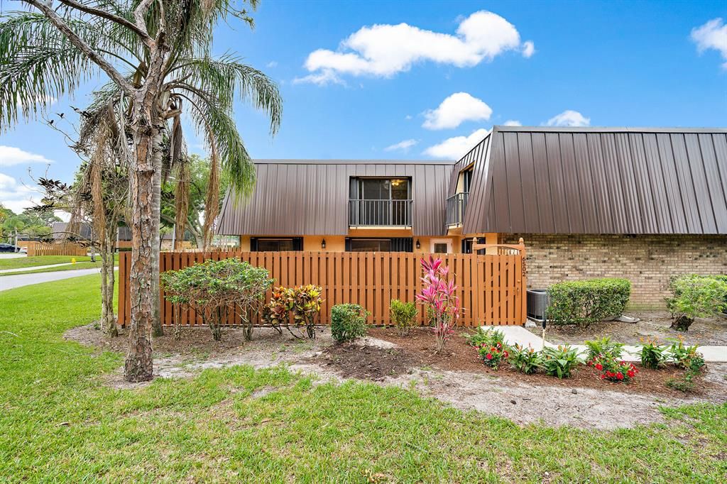 Photo of 6502 SE Windsong Lane, Stuart, FL 34997 (MLS # R10709846)