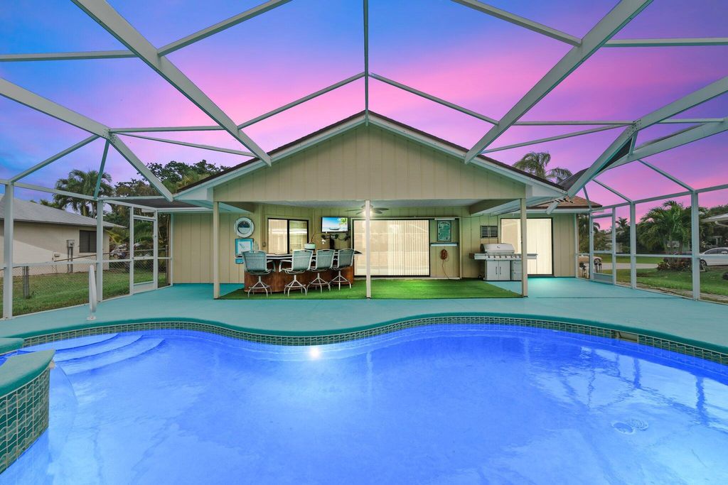 Photo of 2020 SW Woodside Way, Palm City, FL 34990 (MLS # R10971496)