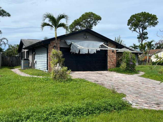 Photo of 2562 SE Petit Lane, Port Saint Lucie, FL 34952 (MLS # B26078508)