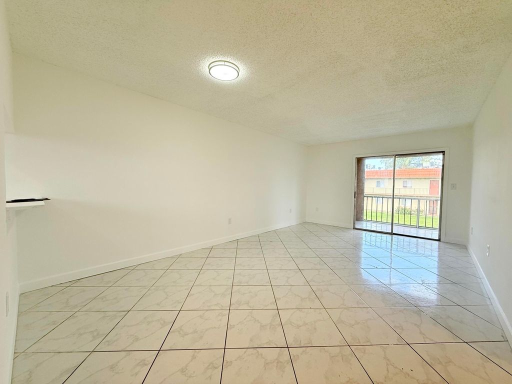 Photo of 6106 Forest Hill Boulevard, West Palm Beach, FL 33415 (MLS # B26022504)