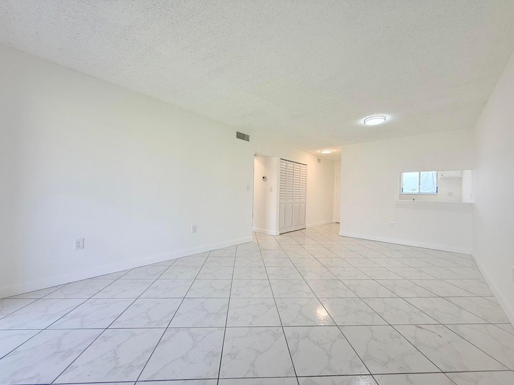 Photo of 6106 Forest Hill Boulevard, West Palm Beach, FL 33415 (MLS # B26022504)