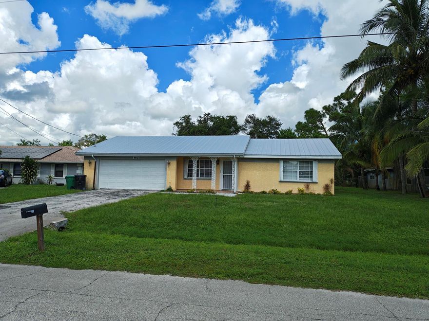 This house is priced to fit your budget. 3 bedroom 2 bathroom 2 car garage with covered screen patio.  No Carpet. Enough land in the back yard for a Pool, for kids and pets to play and to plant your Tree and Garden. No Homeowners Association. Centrally location in the city of Port St Lucie. Shopping and find dinning is only minutes away. House is move-in ready. The Water Heater, Garage Door and Air Condition were changed in 2020. The Metal Roof was replaced in 2023. Call today for an appointment to view and make it your own.
