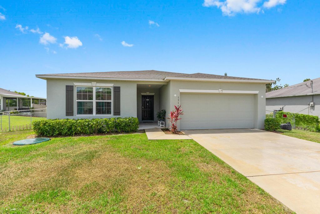 Photo of 1514 SW Kosnar Avenue, Port Saint Lucie, FL 34953 (MLS # R11136059)