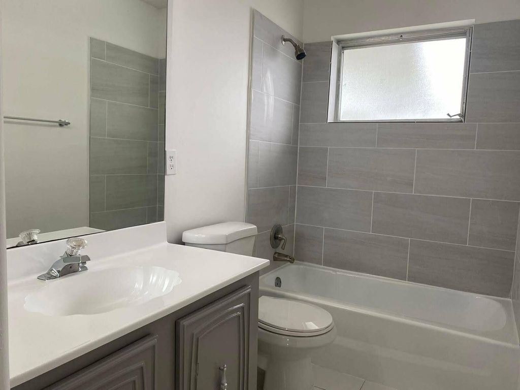 Photo of 2625 W Emory Dr Drive W #F, West Palm Beach, FL 33415 (MLS # B26008473)