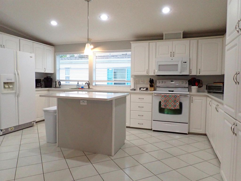 Photo of 3801 Crabapple Drive, Port Saint Lucie, FL 34952 (MLS # R11016081)