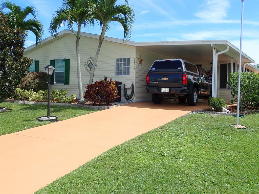 Photo of 3801 Crabapple Drive, Port Saint Lucie, FL 34952 (MLS # R11016081)