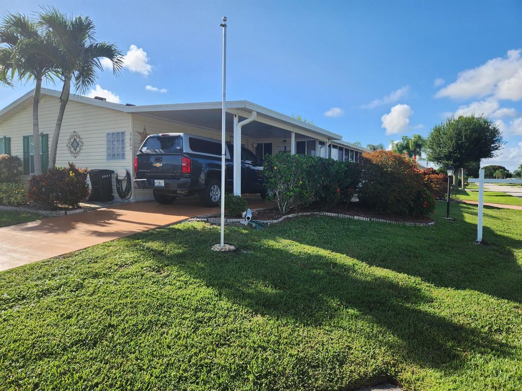 Photo of 3801 Crabapple Drive, Port Saint Lucie, FL 34952 (MLS # R11016081)