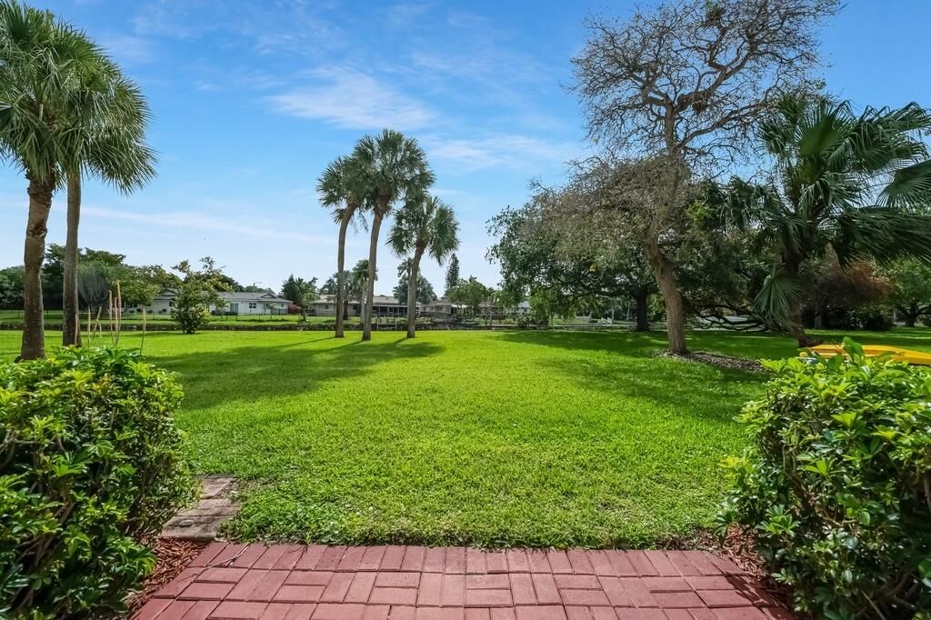 Photo of 7928 Sanibel Drive, Tamarac, FL 33321 (MLS # B26014559)