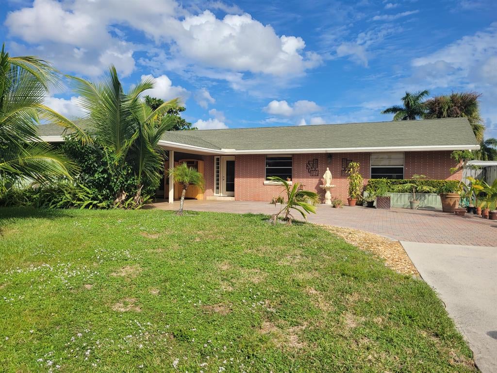 Photo of 10044 Dasheen Avenue, Palm Beach Gardens, FL 33410 (MLS # R10753232)