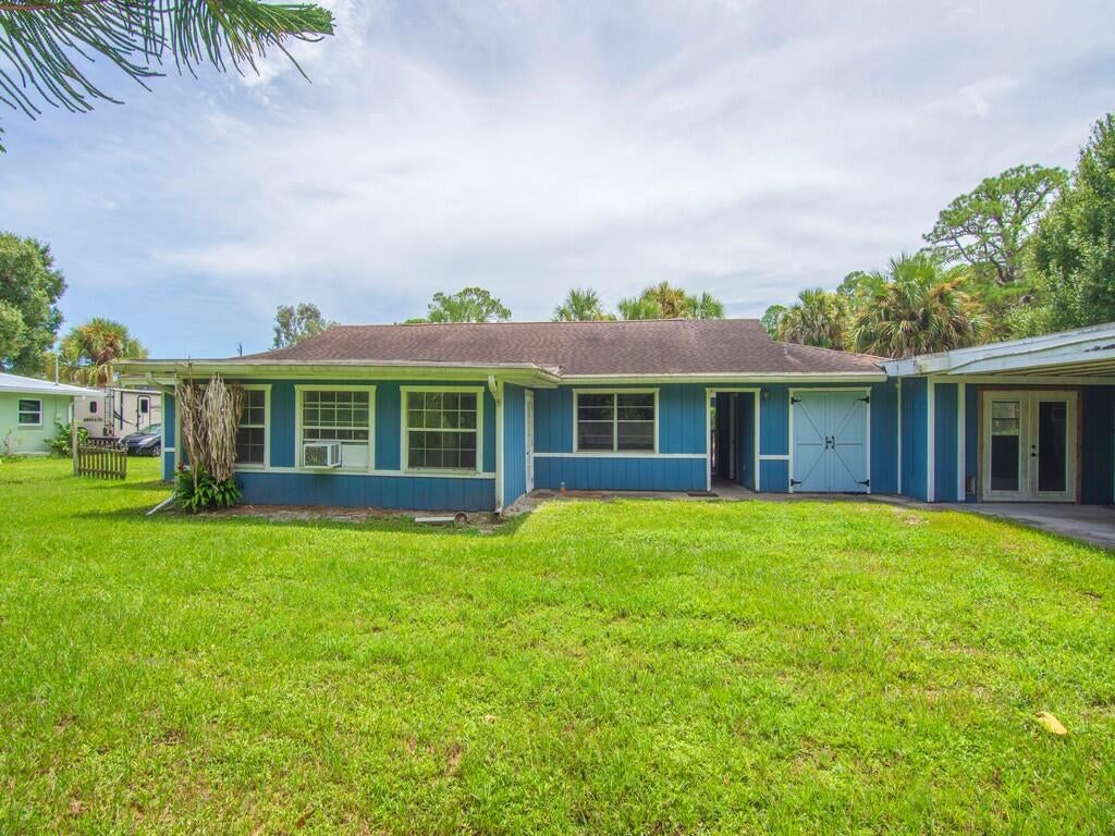 Photo of 8206 Lakeland Boulevard, Fort Pierce, FL 34951 (MLS # B26069822)