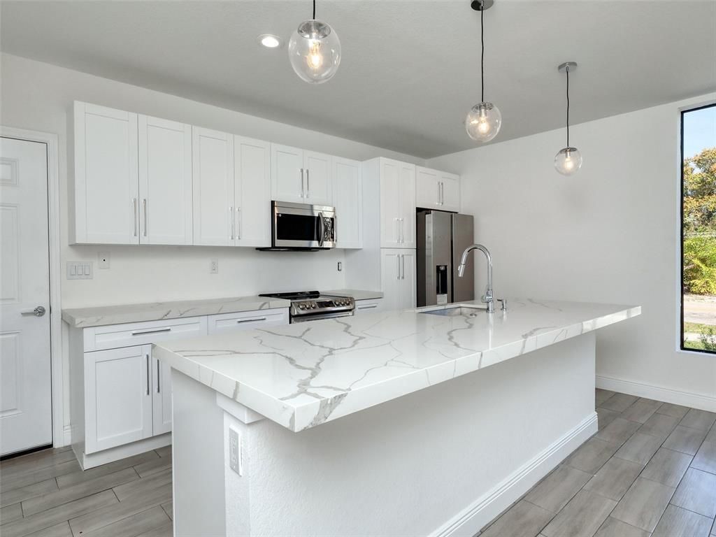 Photo of 102 NW 41st Street #104, Oakland Park, FL 33309 (MLS # B26027517)