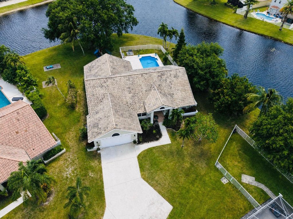 Photo of 6031 Wedgewood Village Circle, Greenacres, FL 33463 (MLS # B26026038)