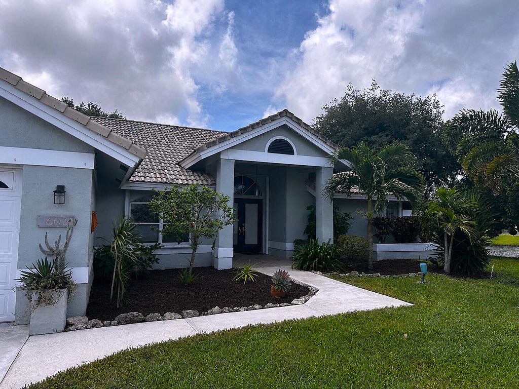 Photo of 6031 Wedgewood Village Circle, Greenacres, FL 33463 (MLS # B26026038)