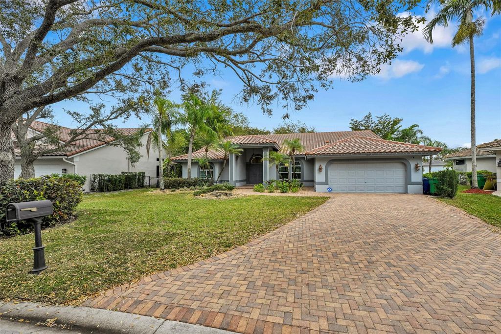 Photo of 4911 NW 103rd Avenue, Coral Springs, FL 33076 (MLS # F10552075)