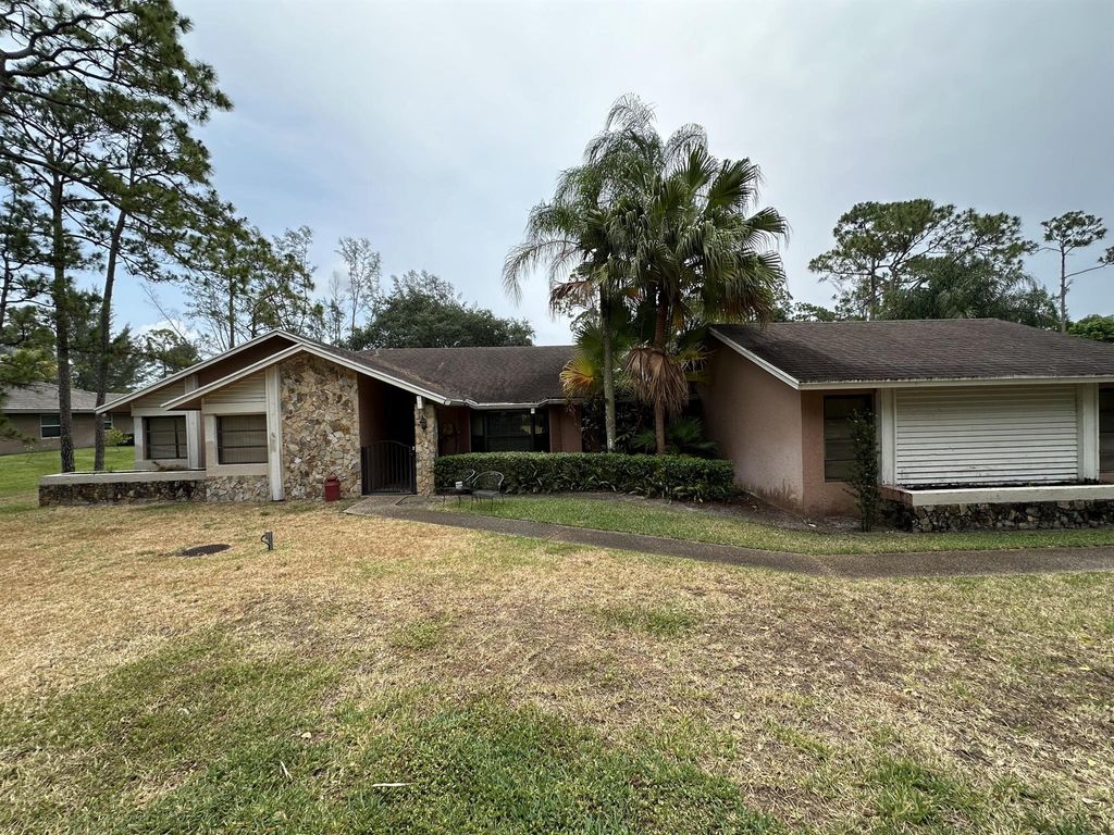 Photo of 5950 NW 66th Way, Parkland, FL 33067 (MLS # R10989004)