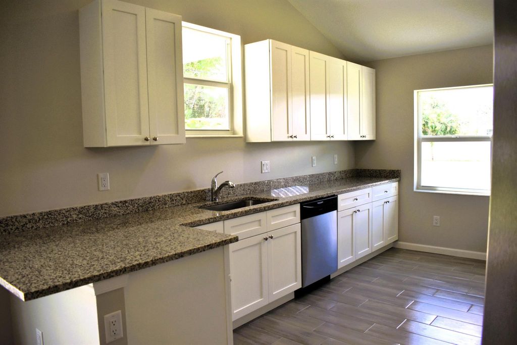 Photo of 3109 SW Curcuma Street, Port Saint Lucie, FL 34953 (MLS # R11119175)