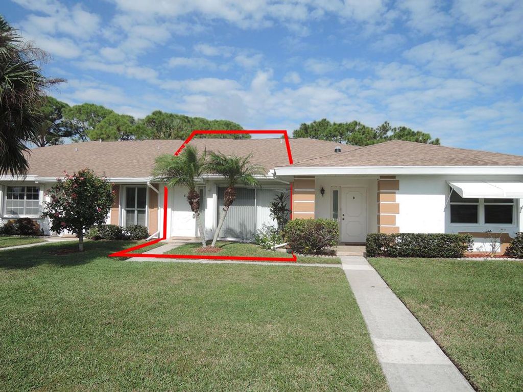 Photo of 1014 Pheasant Run Drive #C, Fort Pierce, FL 34982 (MLS # R10721458)