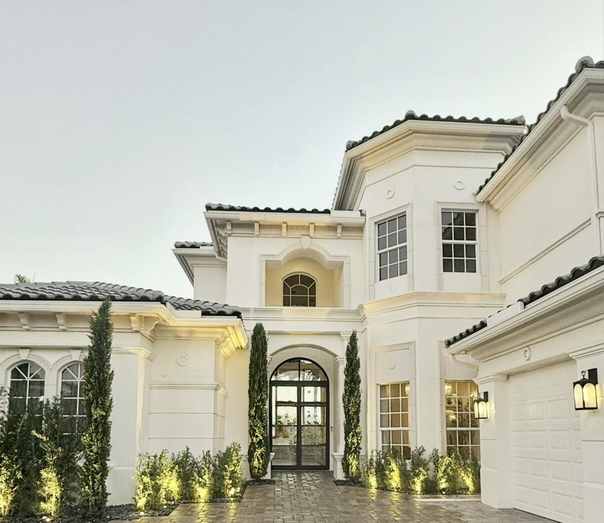 Experience resort-style living in this fully redesigned, move-in-ready luxury home in the prestigious Jupiter Country Club. This 5-star estate blends modern sophistication with timeless elegance. Interior Highlights: Designer chef's kitchen with quartz countertops and backsplash, Sub-Zero, Thermador & JennAir appliances, built-in coffee maker and gas range. Grand ceilings and ultra high-end fixtures and finishes throughout.