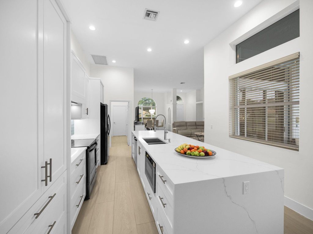 Photo of 9070 Cypress Hollow Drive, Palm Beach Gardens, FL 33418 (MLS # R11128588)