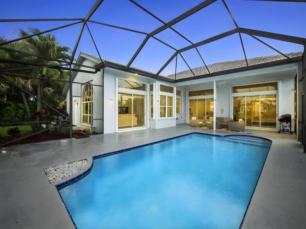 Photo of 9070 Cypress Hollow Drive, Palm Beach Gardens, FL 33418 (MLS # R11128588)