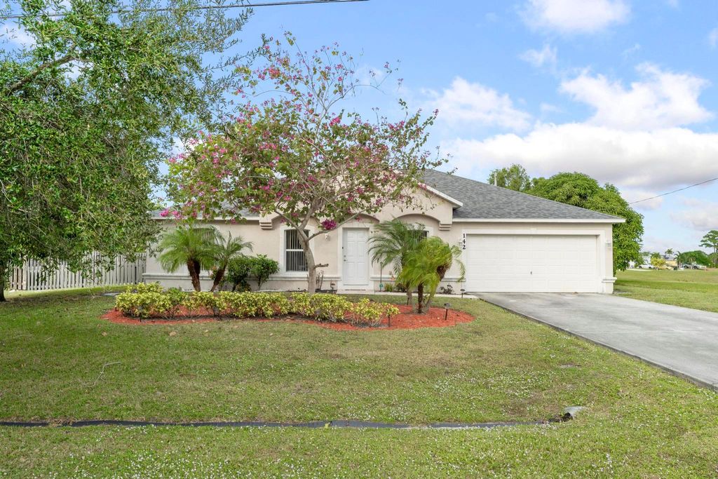 Photo of 142 SW Tulip Boulevard, Port Saint Lucie, FL 34953 (MLS # R10943286)
