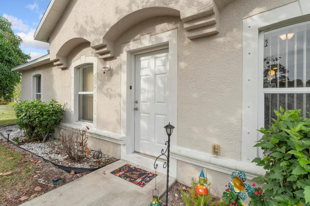 Photo of 142 SW Tulip Boulevard, Port Saint Lucie, FL 34953 (MLS # R10943286)