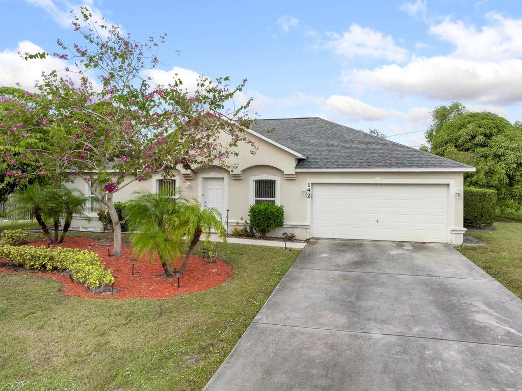 Photo of 142 SW Tulip Boulevard, Port Saint Lucie, FL 34953 (MLS # R10943286)