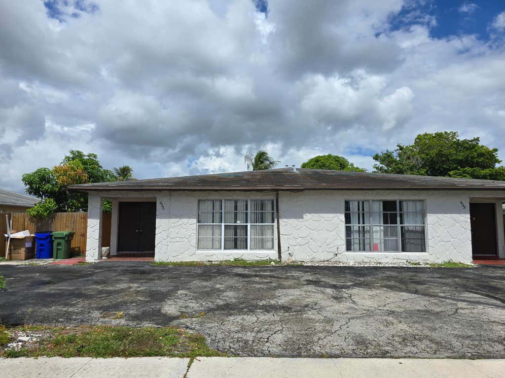 Photo of 435 SW 61st Terrace, Margate, FL 33068 (MLS # B26056677)