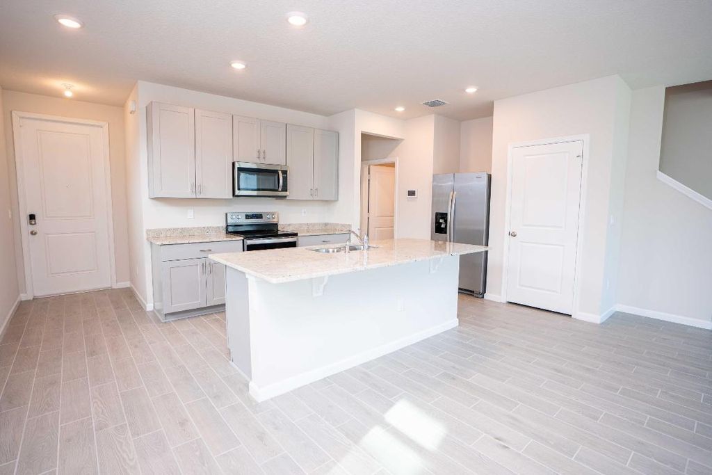 Photo of 197 Osprey Preserve Boulevard, Jensen Beach, FL 34957 (MLS # R11122896)